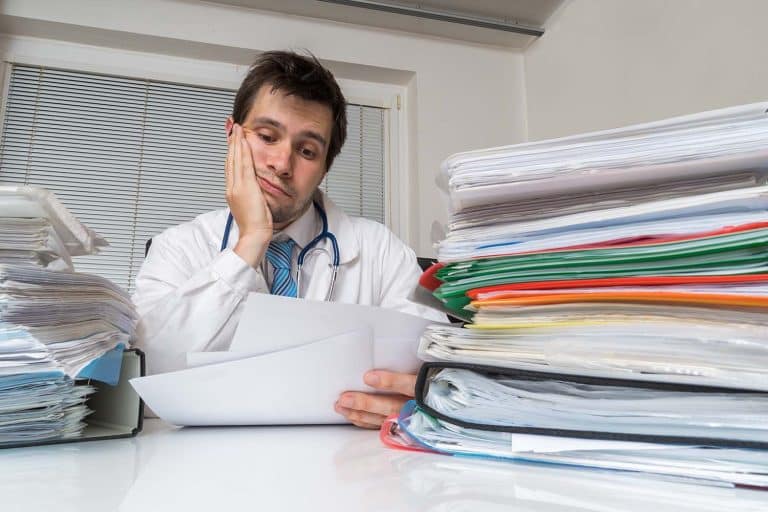 Doctor frustrated with paperwork